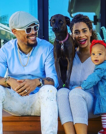 Kelly McCreary with her husband and their baby.